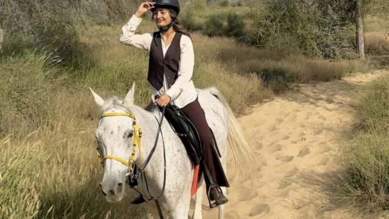 Sunset horse riding inside the lush trails of Mushrif Park, Dubai